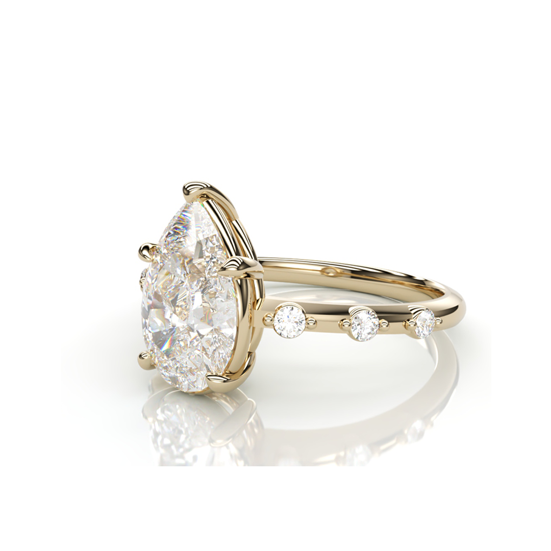 18K Yellow Gold Pear LAB Diamond Ring with 3 small Diamonds on each side