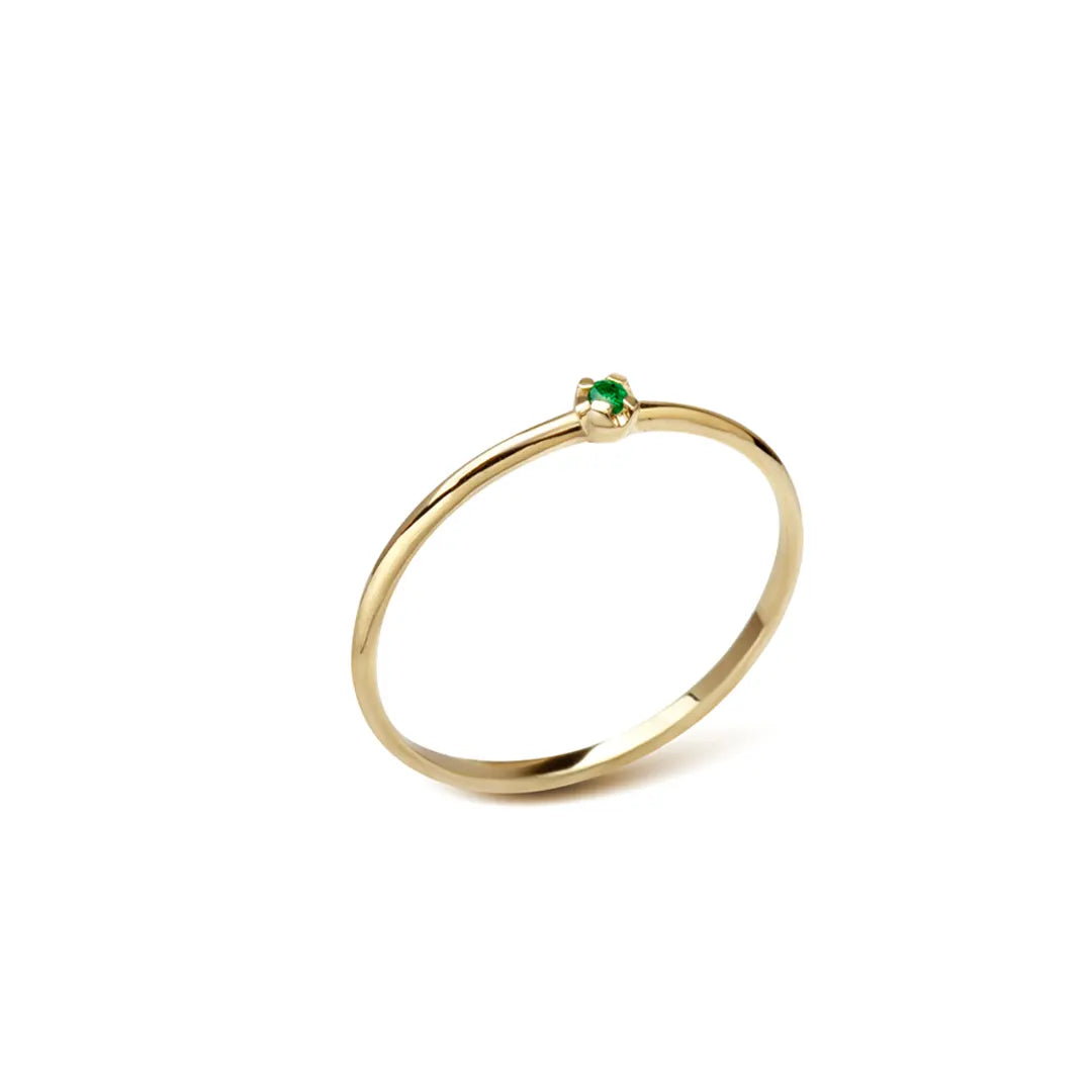 14K Gold Band Ring with a tiny Emerald