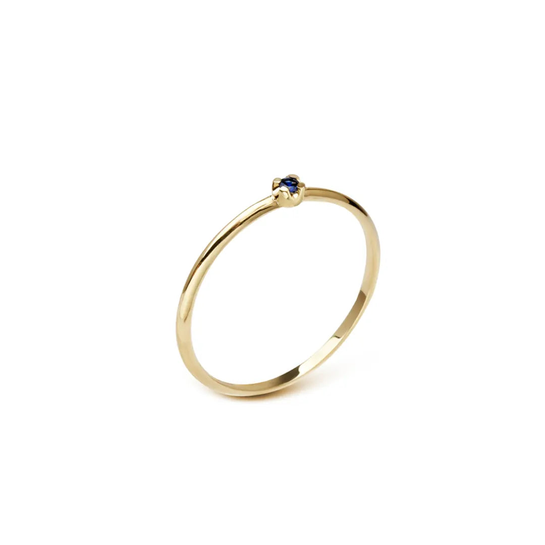 14K Gold Band Ring with a tiny Sapphire