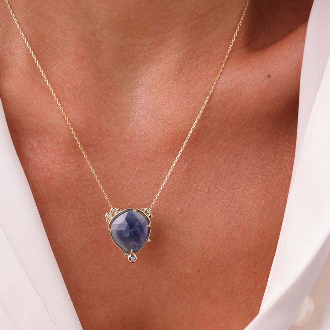 14K Gold Near-round Sapphire Necklace  with a diamond