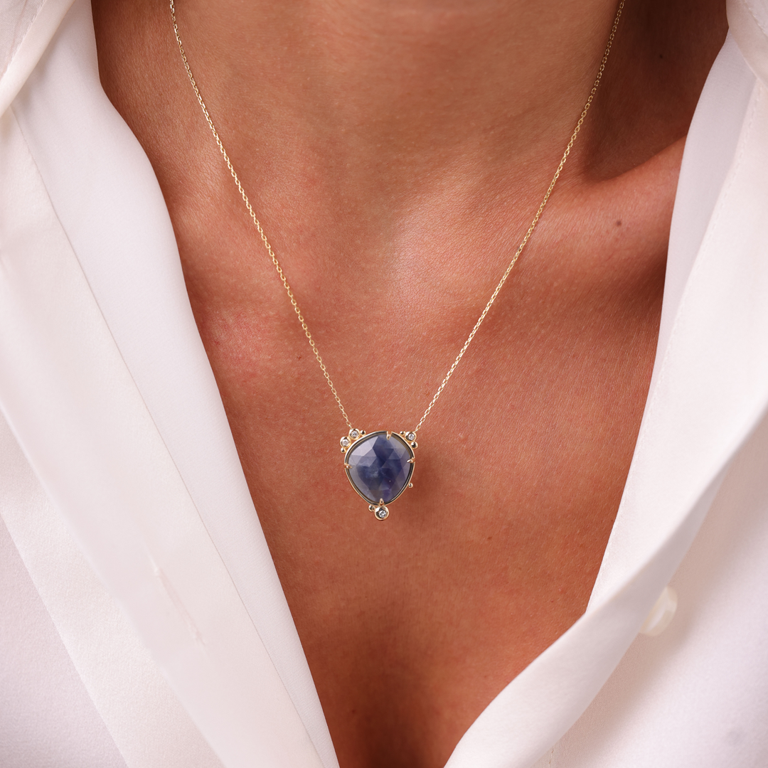 14K Gold Near-round Sapphire Necklace  with a diamond