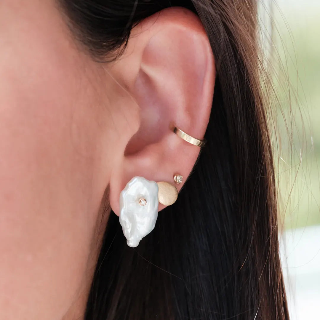 14K Gold Baroque pearl stud earrings with a Diamond