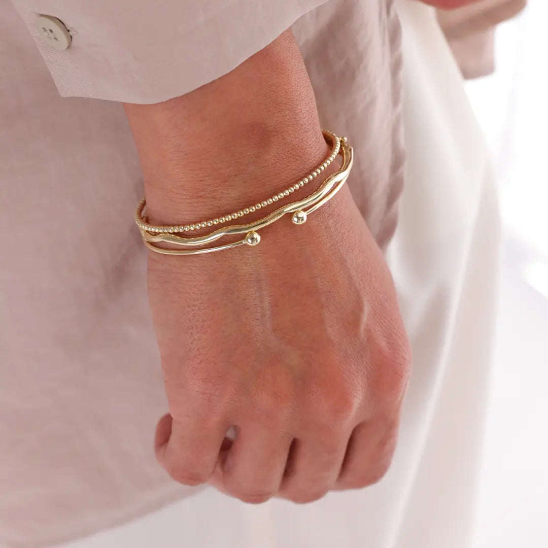 14K gold Thin Open Bracelet with 2 bold Dots