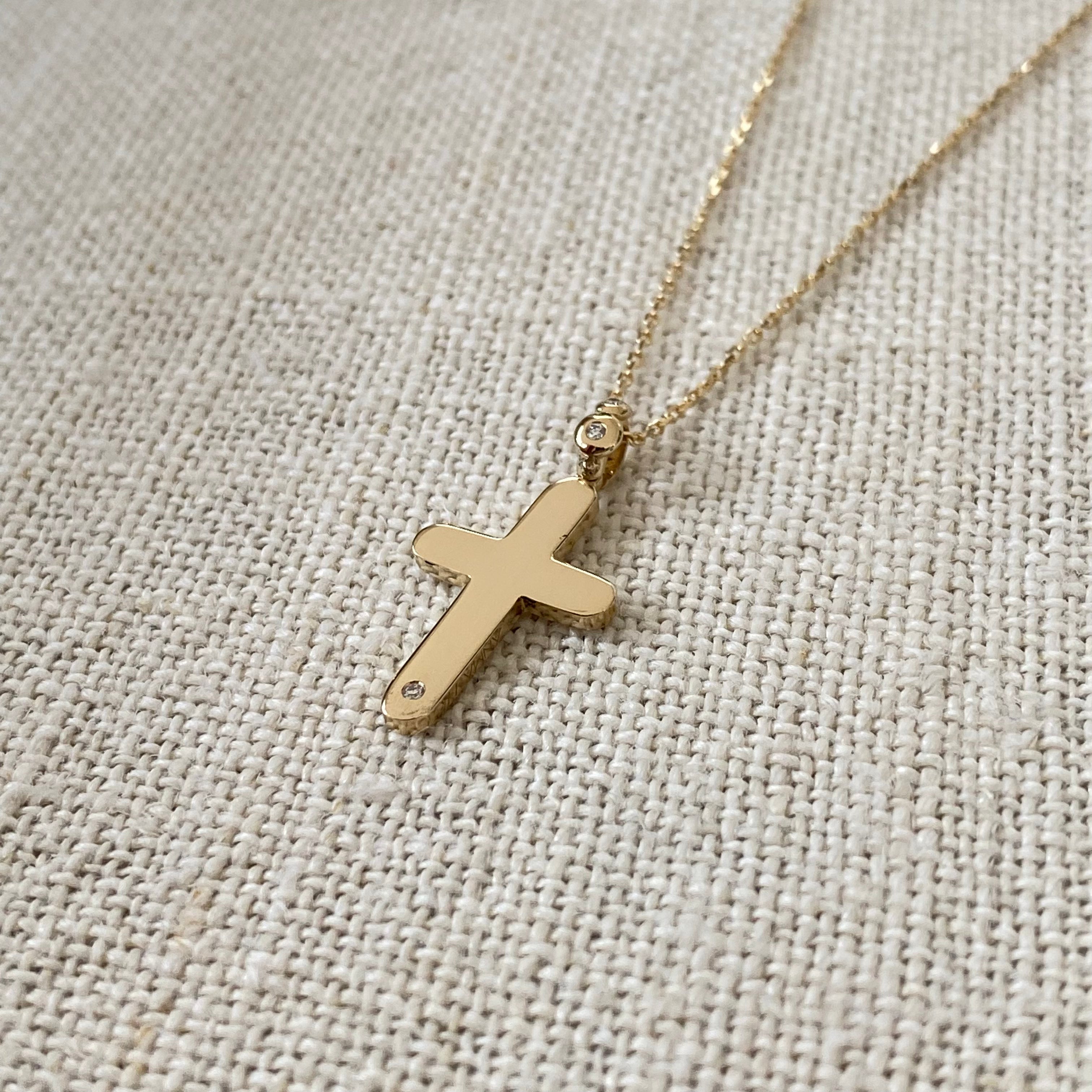 Curved Edges Gold Cross Pendant with Diamond Hoop