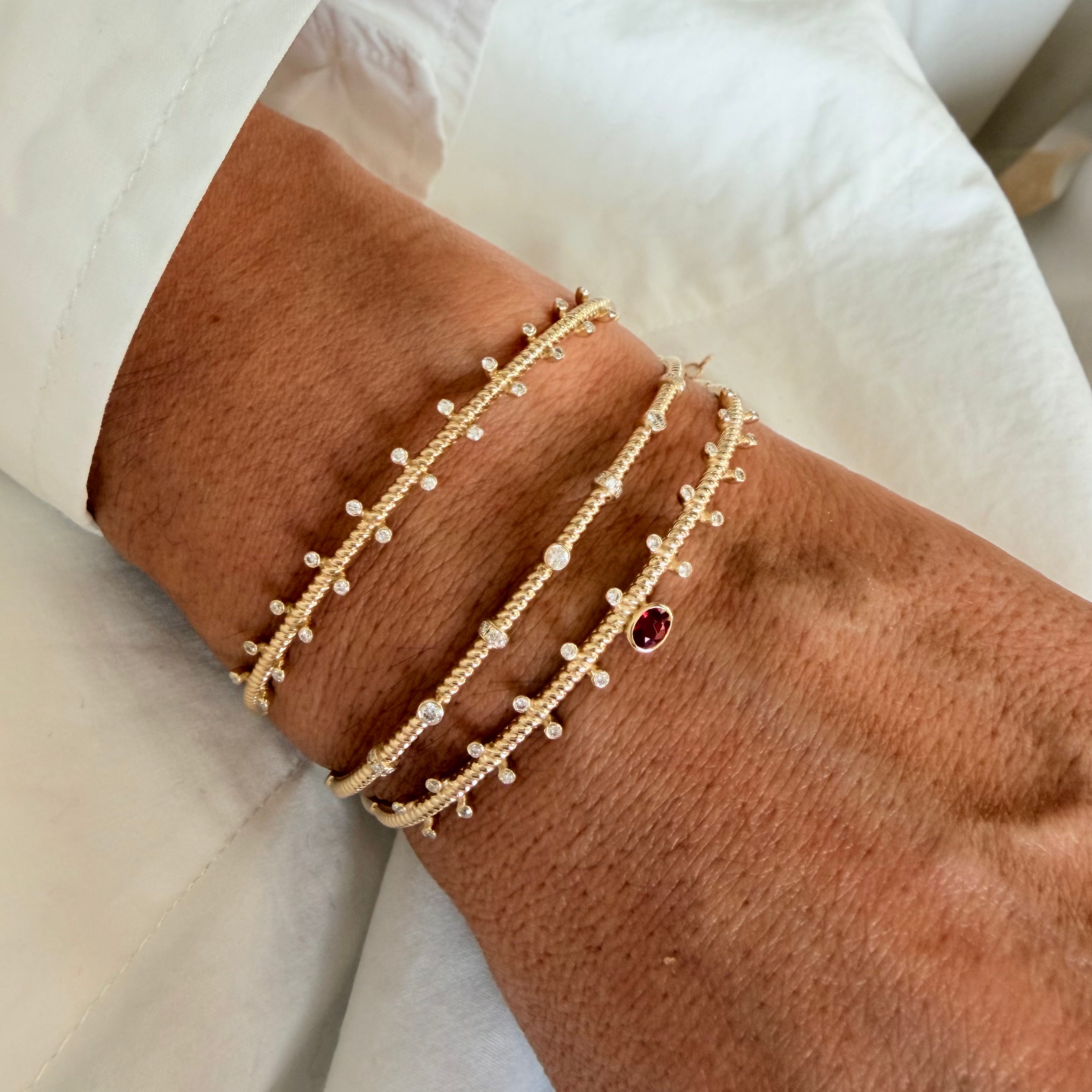 14K Gold Twisted Bracelet with Diamonds and Ruby