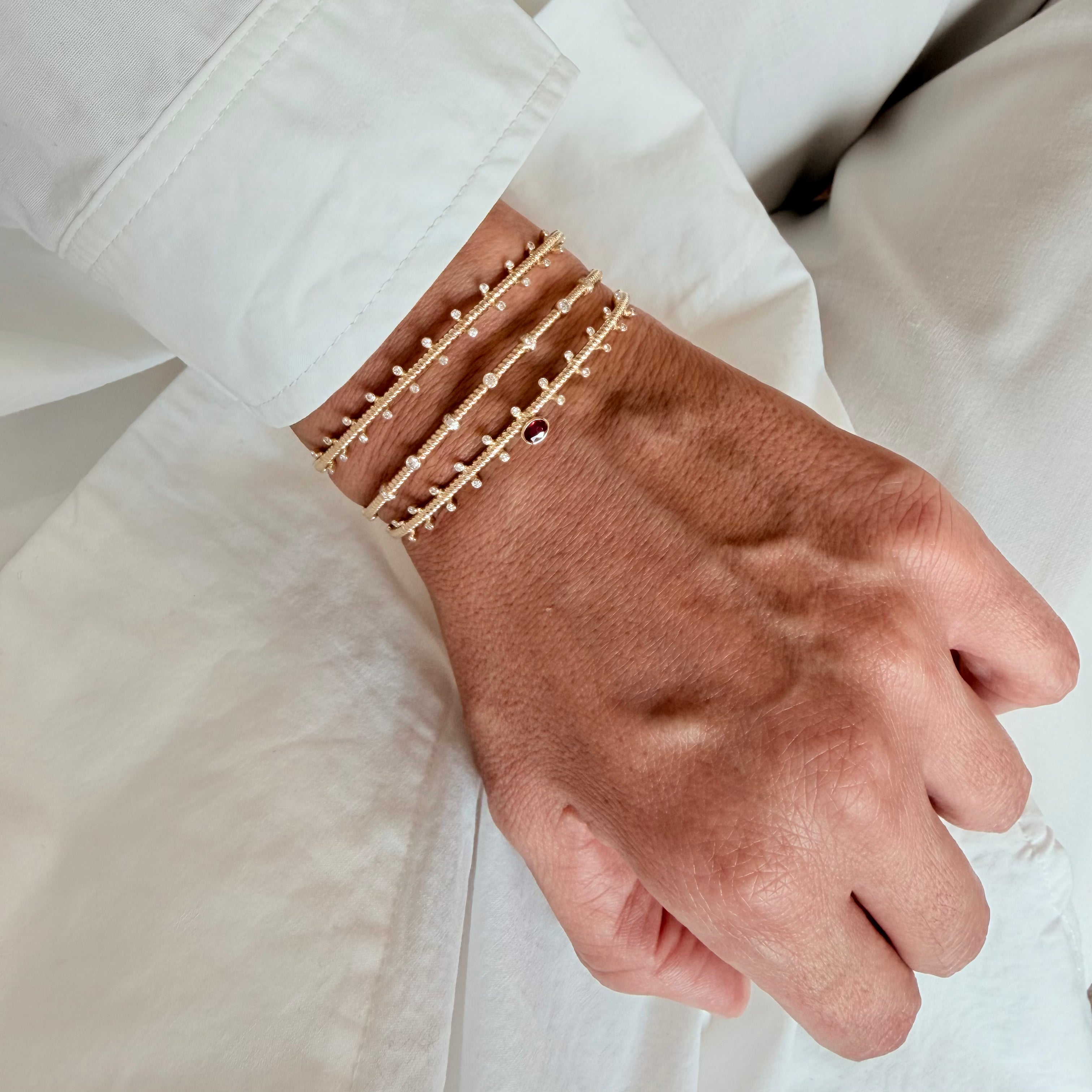 14K Gold Twisted Bracelet with Diamonds and Ruby