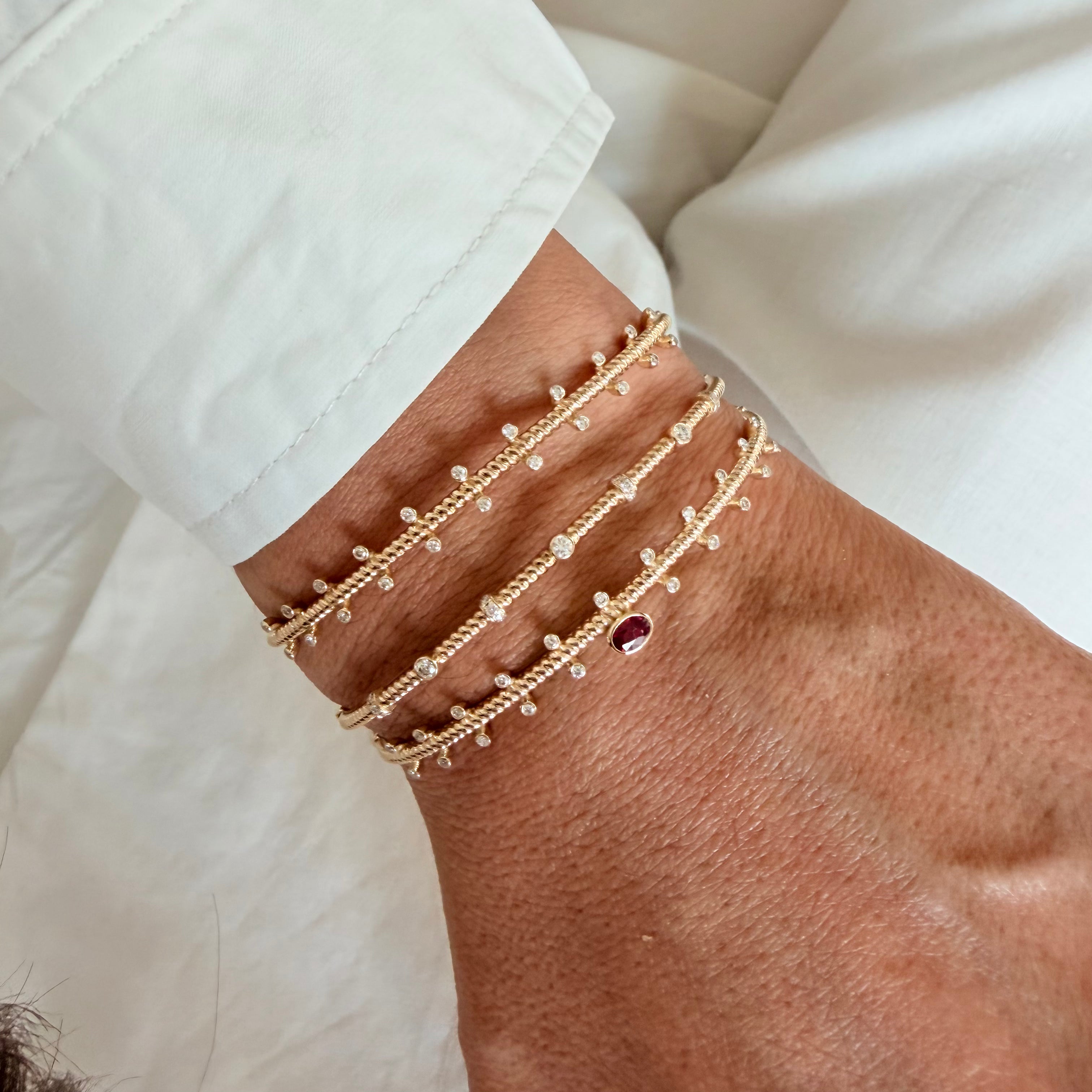 14K Gold Twisted Bracelet with Diamonds and Ruby