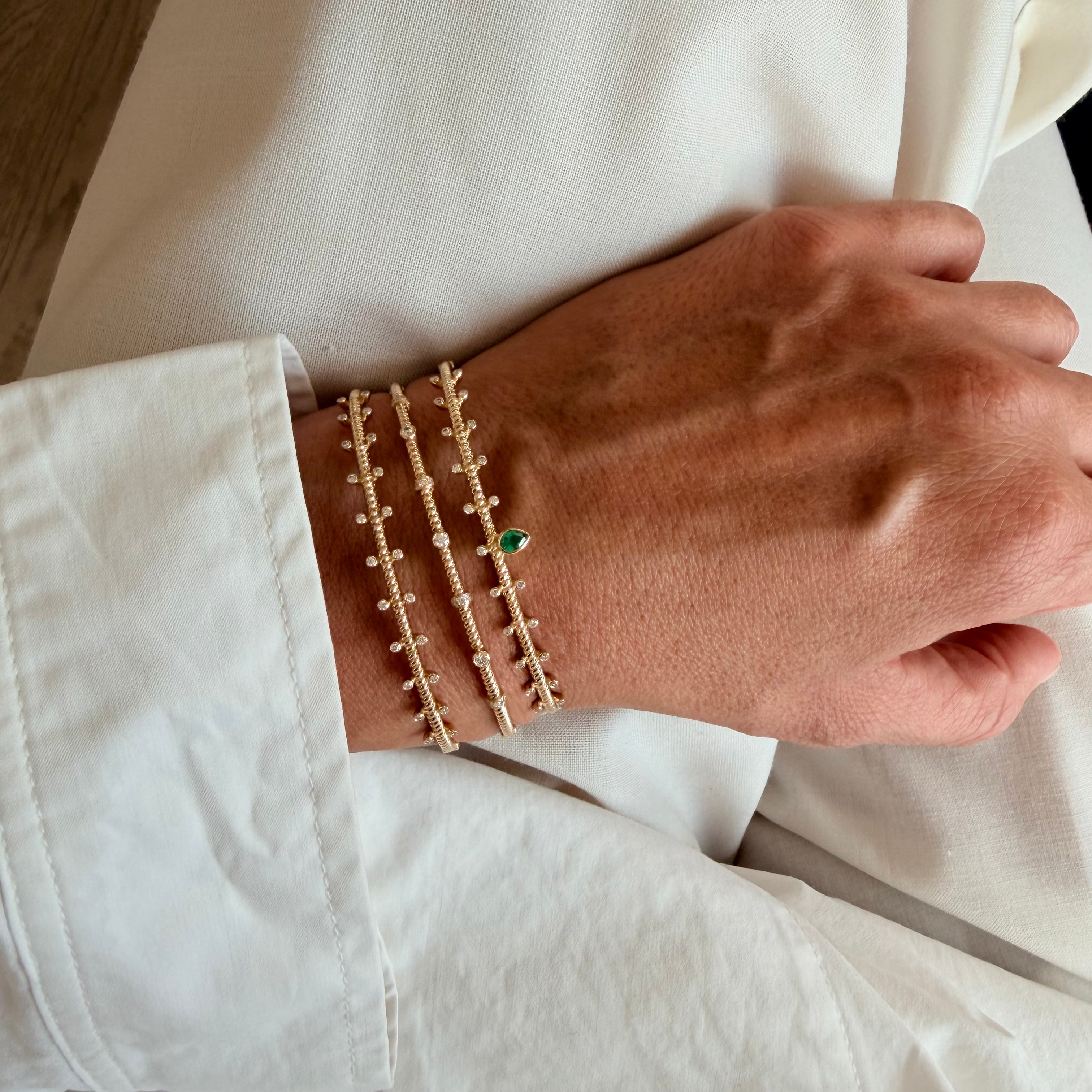 14K Gold Twisted Bracelet with Diamonds and Emerald
