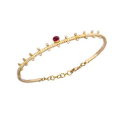 14K Gold Twisted Bracelet with Diamonds and Ruby