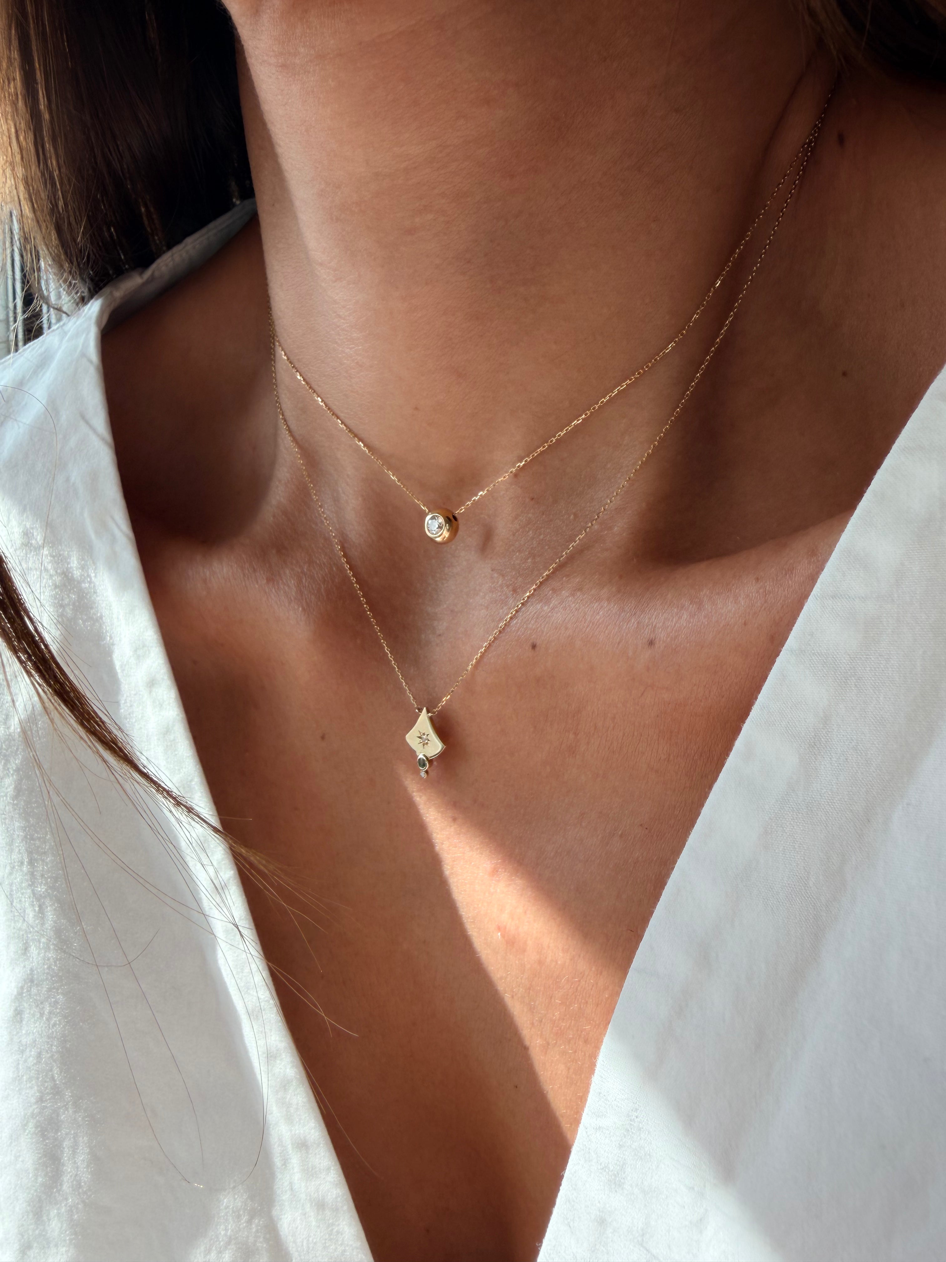 14K Gold Curved Triangle Diamond Star Necklace with Emerald