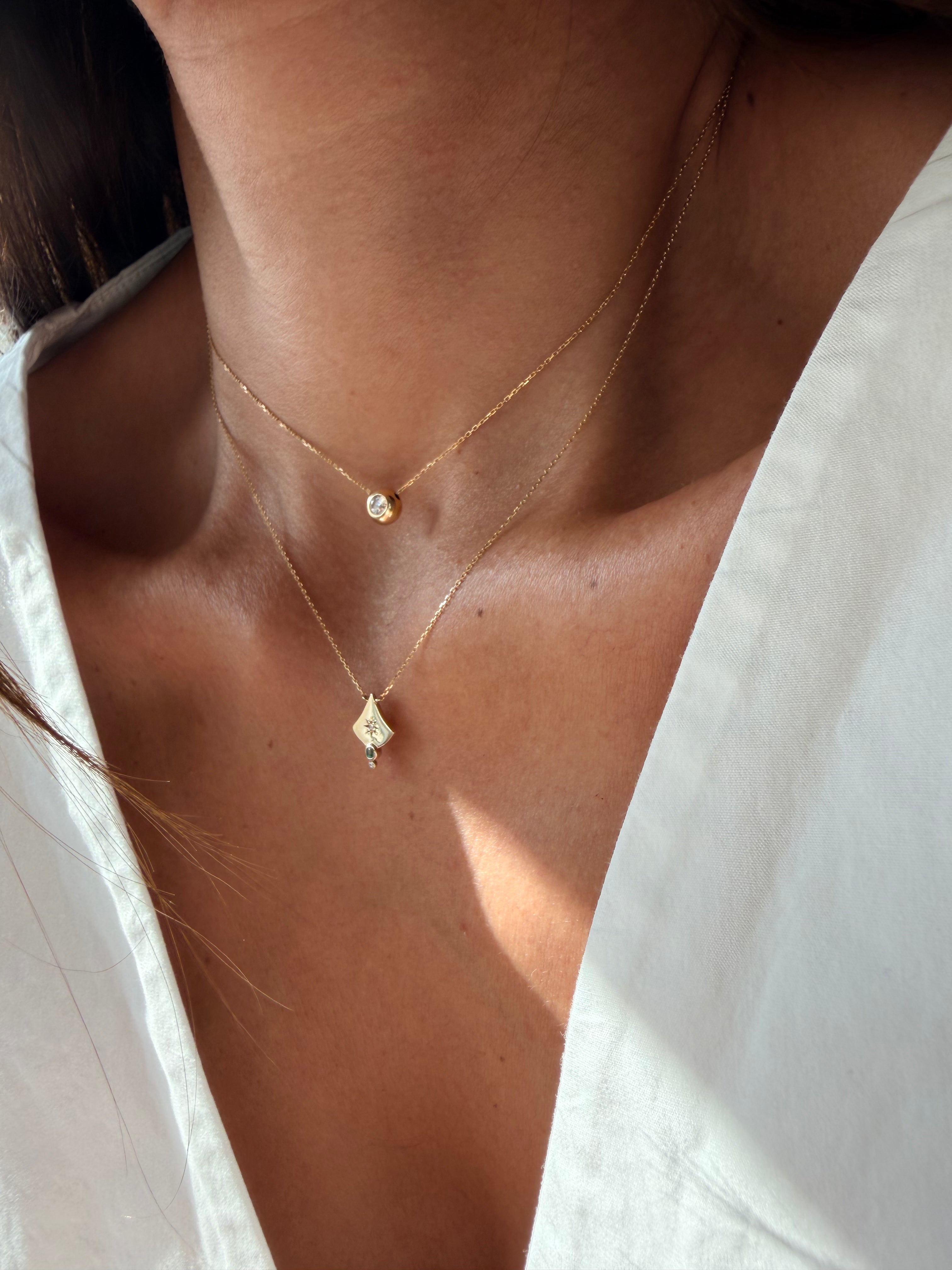 14K Gold Curved Triangle Diamond Star Necklace with Emerald