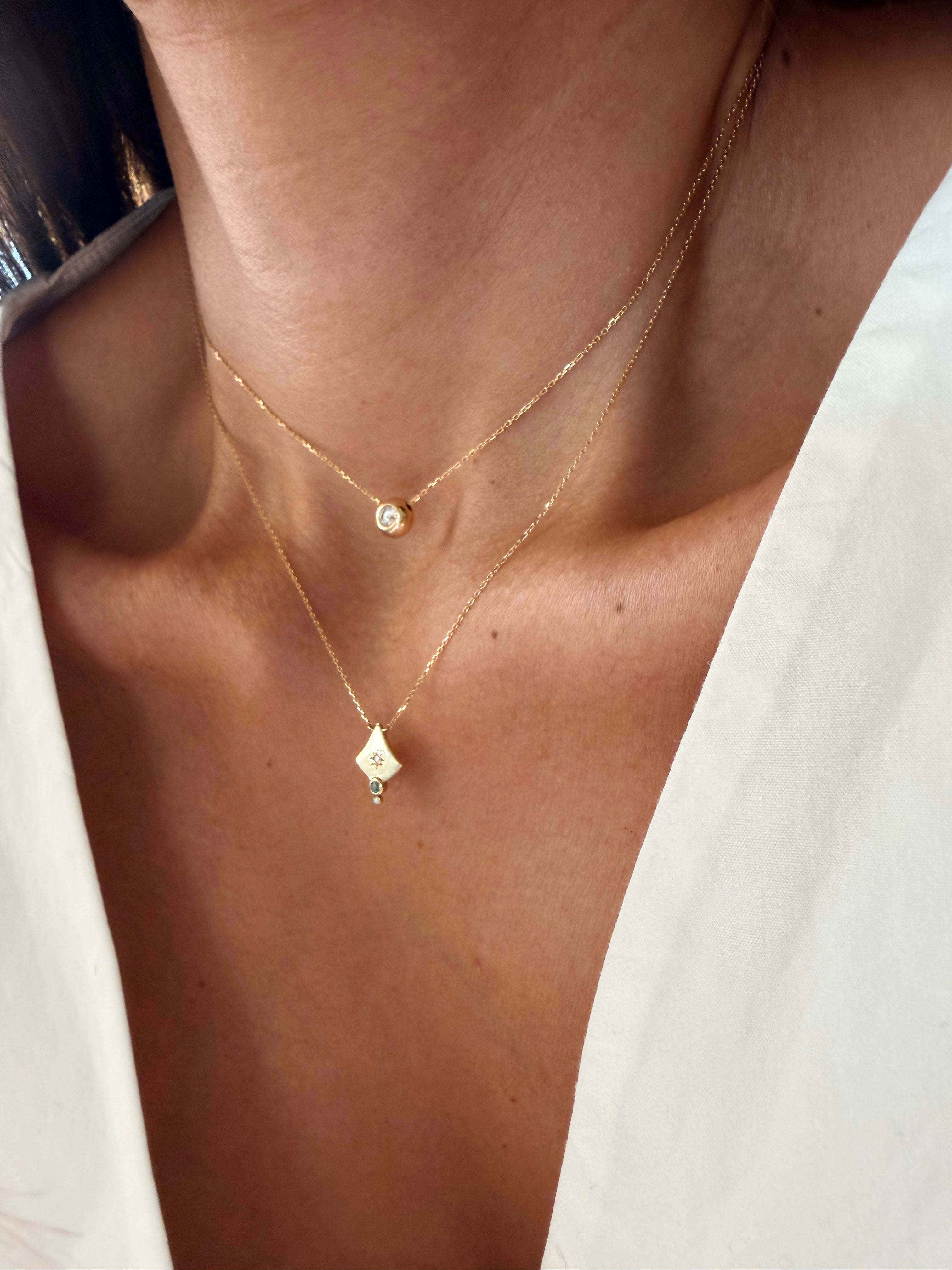 14K Gold Curved Triangle Diamond Star Necklace with Emerald